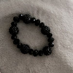 Heavy black crystal bracelet.